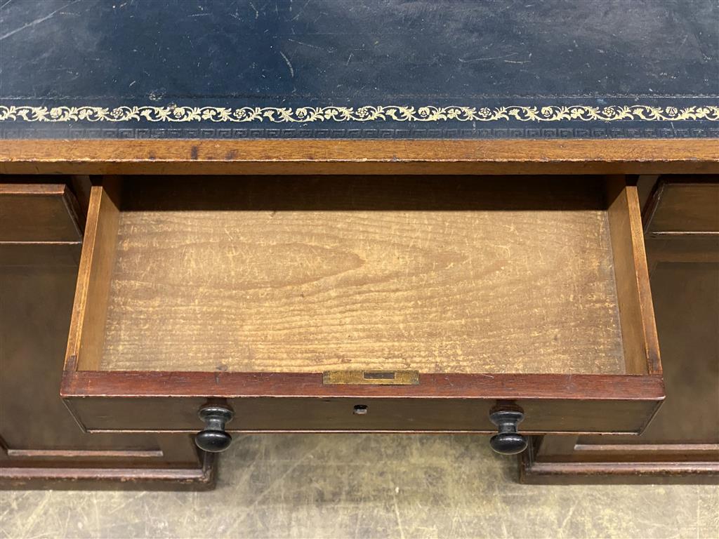 A Victorian mahogany kneehole writing table, width 102cm, depth 45cm, height 74cm